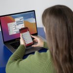 woman-searching-something-internet-using-her-smartphone-while-being-home